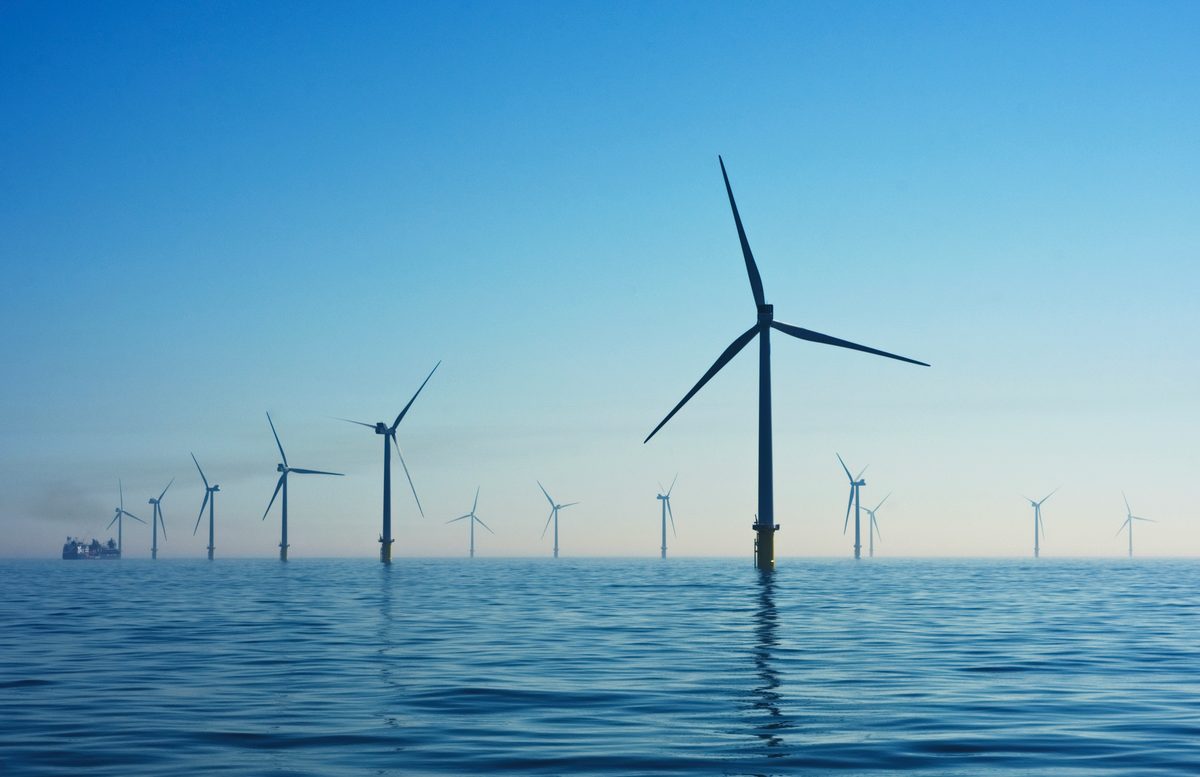 Offshore wind turbine farm — context for XEYAR renewable developer BESS co-location
